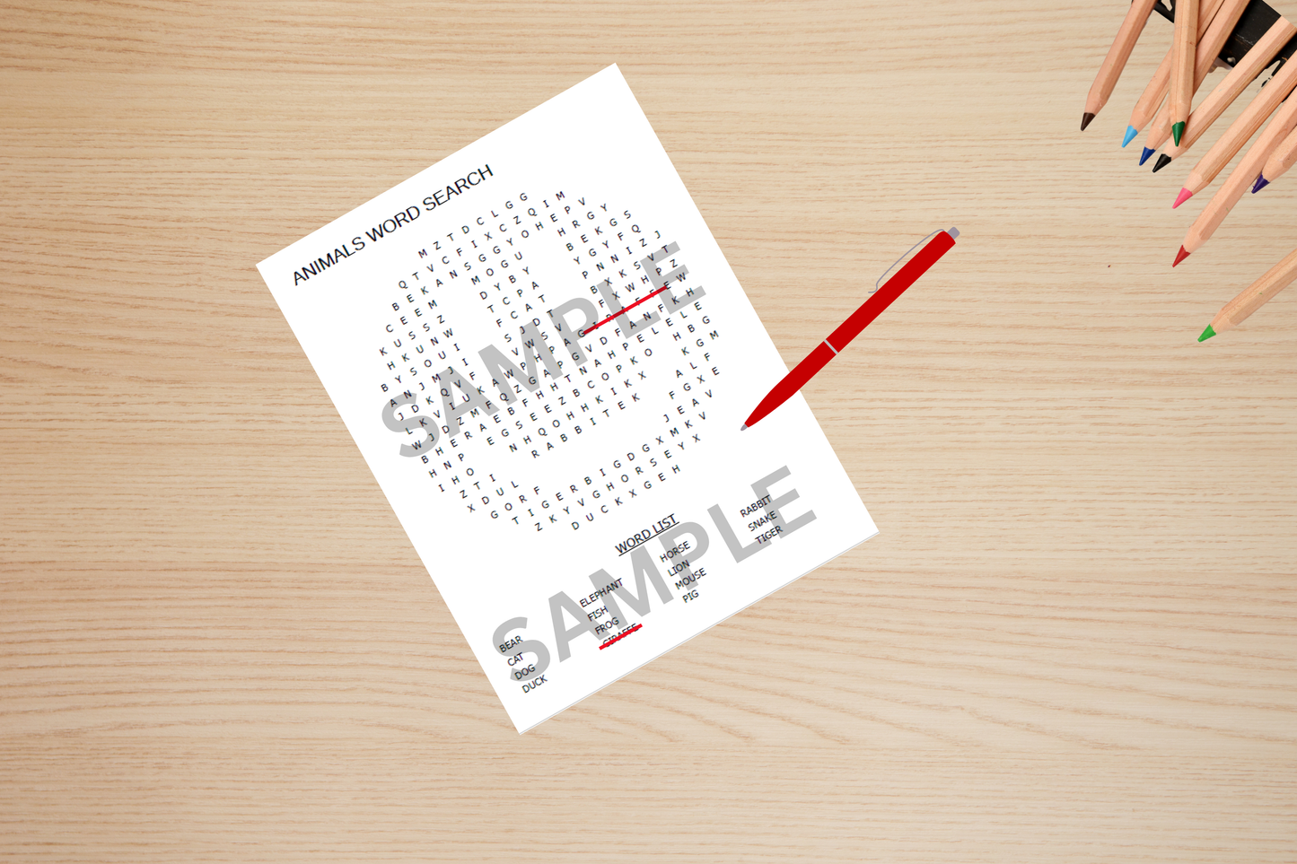 High-definition word search printable laid out on a school classroom desk surrounded by kids' learning supplies.
