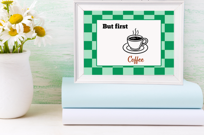 Digital “But First Coffee” art displayed in a white photo frame on top of family recipe cookbooks.