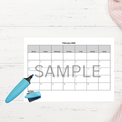 February 2026 printable calendar on minimal table.