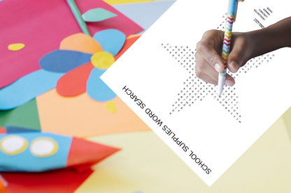 Printable word search puzzle for children on a bright classroom table with crafts.