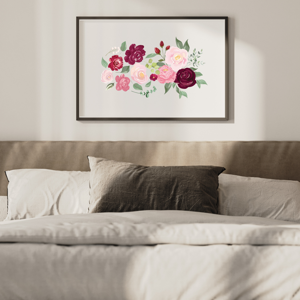 The floral printable art displaying delicate roses and botanical elements, placed above a bed to create a calm and restful bedroom atmosphere.