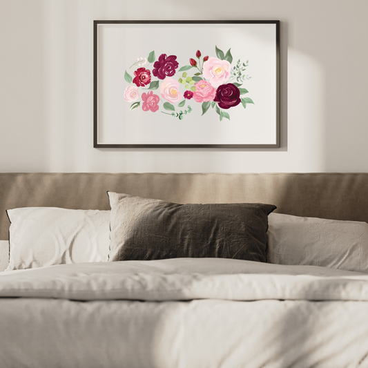 The floral printable art displaying delicate roses and botanical elements, placed above a bed to create a calm and restful bedroom atmosphere.