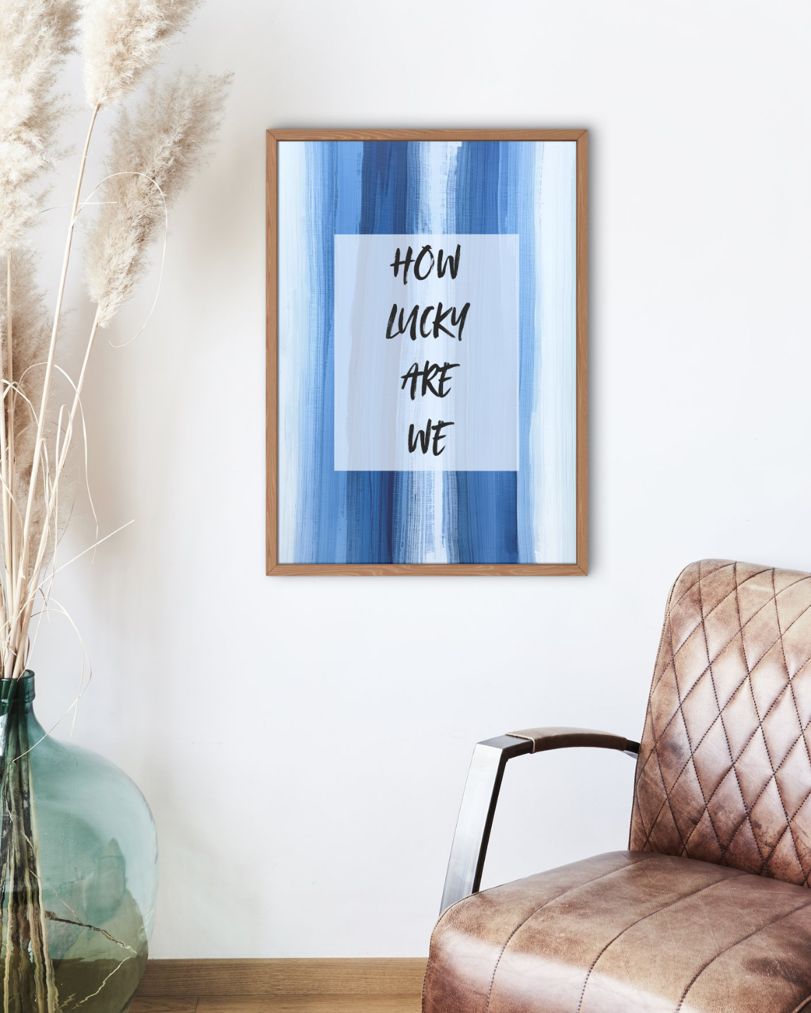 Contemporary blue brush stroke wall art styled in neutral lounge