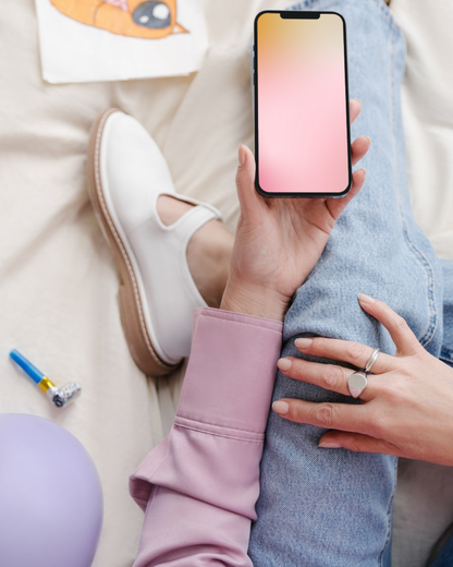 iPhone wallpaper HD gradient background in orange and soft pink colours.