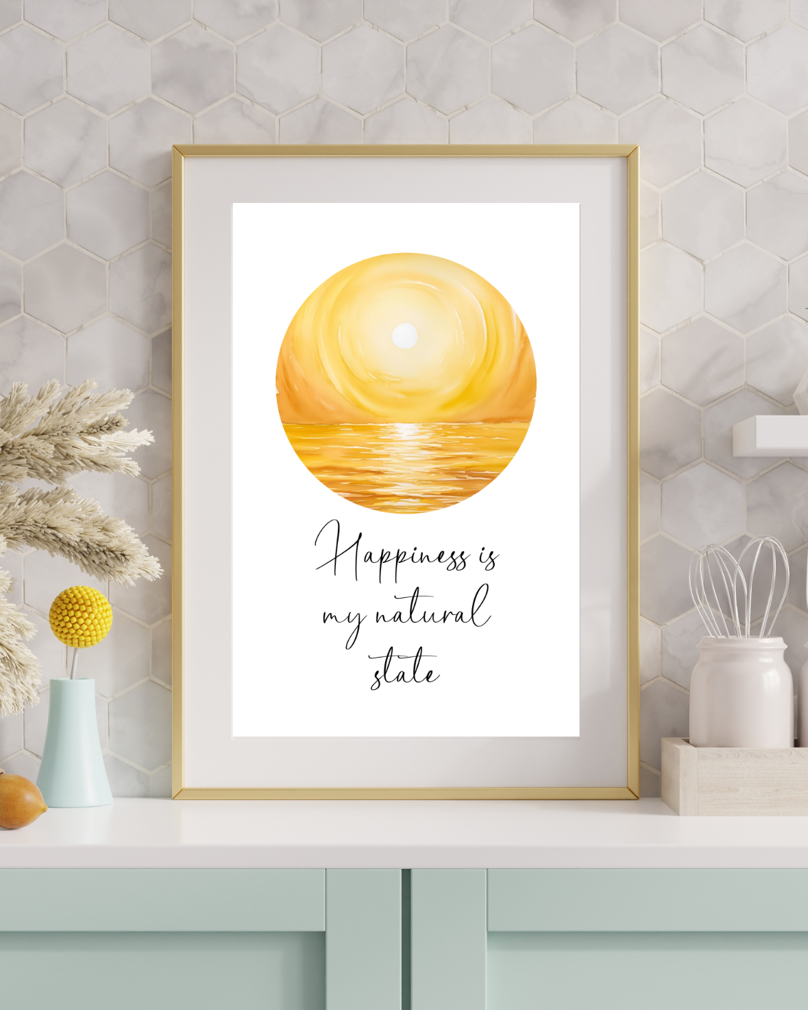 Printable wall art with the quote “Happiness Is My Natural State” displayed above a neutral modern kitchen counter.