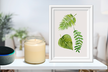 Printable botanical leaf art print framed in a modern natural living room