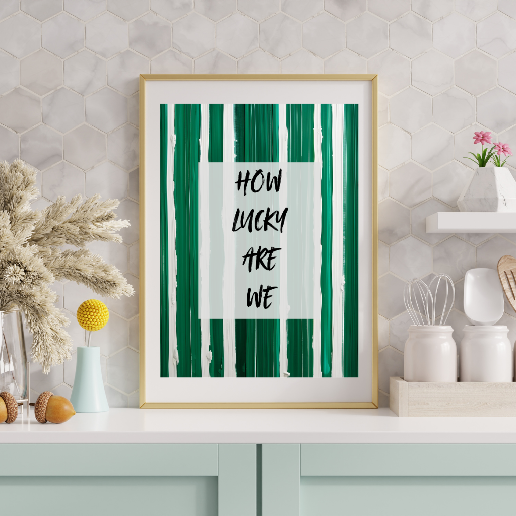 modern minimalist typography wall art with green acrylic paint strokes above a kitchen counter