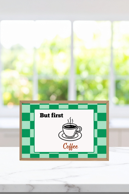 Printable coffee poster with green checkerboard design in a bright kitchen, with the typography "But first Coffee."