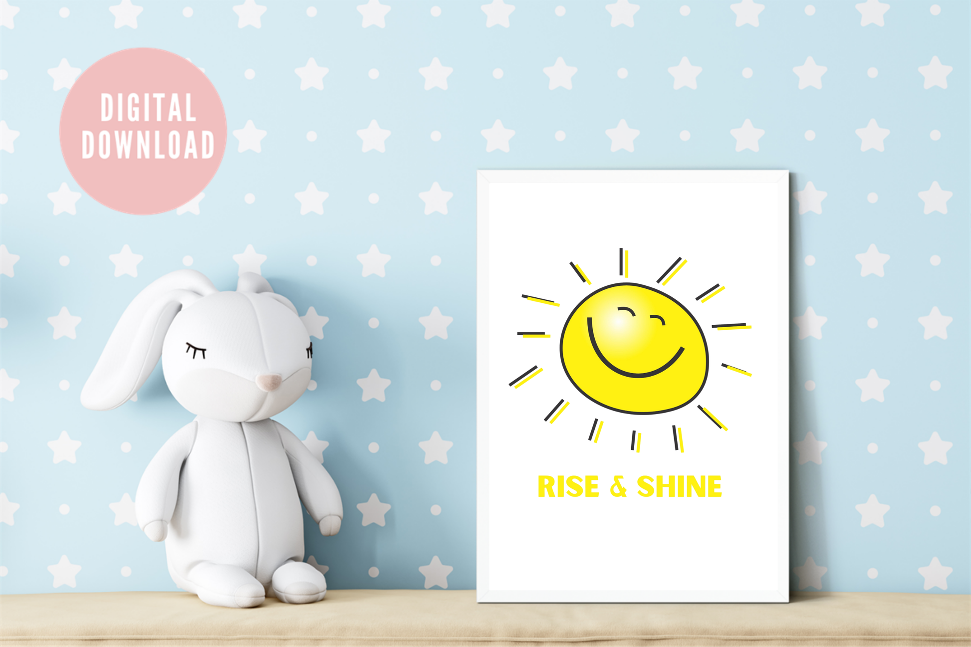 The Rise and Shine smiley sun wall art print, showing a bright yellow sun illustration with uplifting text, styled in a simple white frame above a sofa to bring warmth and positive energy into a nursery
