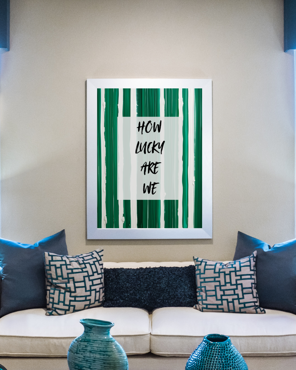 how lucky are we typography print styled above sofa in modern interior
decor